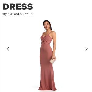 Only worn once for 4 hours. Has been dry cleaned